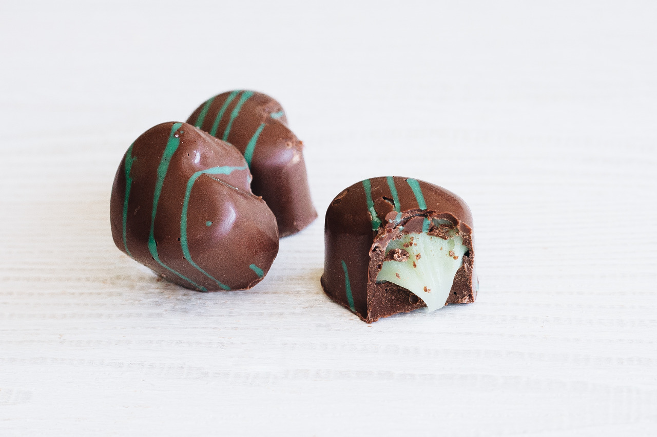 Chocolate with mint-green drizzle and filling